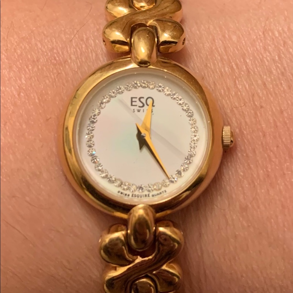 Gold colored watch